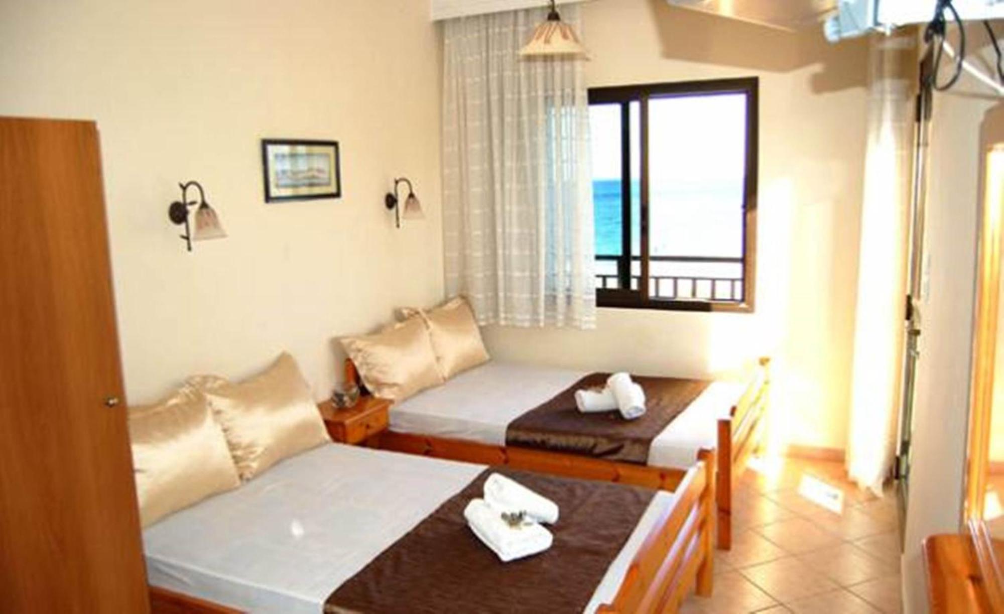 Melachrini Apartments Nea Vrasna Quarto foto
